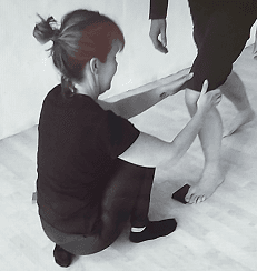 Debbie assessing foot movement during an Anatomy in Motion session